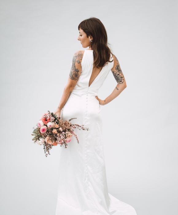Bride holding flower bouquet from Buy a Bunch